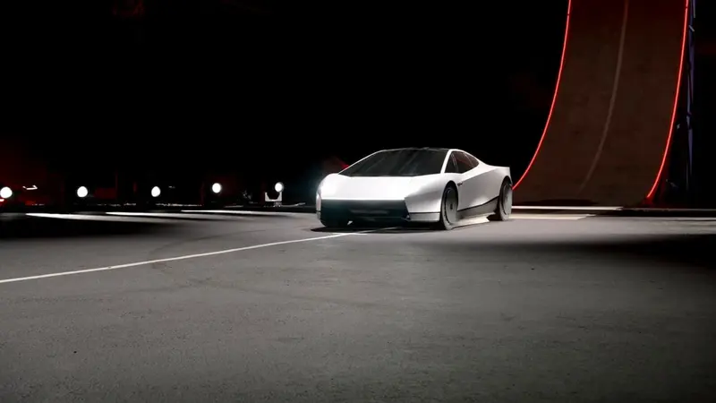 O novo Tesla Roadster, branco, de frente, com os faróis acesos, numa pista escura ao lado da rampa curva usada na demonstração